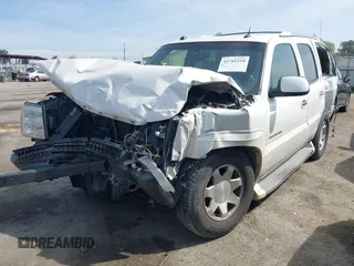 2005 Cadillac Escalade z VIN 1GYEC63N25R200026, wystawiony jako IAAI lot #41761210 z przebiegiem 226 747 mil mil oraz . Historia ofert i sprzedaży dostępna na DreamBid. Obrazek 22.