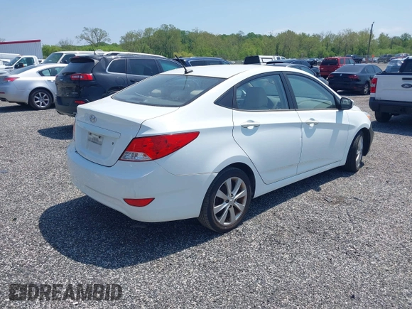 2014 Hyundai Accent GLS with VIN KMHCU4AE8EU589409, listed as a IAAI auction lot 42171087 with 209,204 mi miles. Bid and sale history available at carsss.com. Image 4.