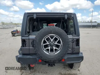 2024 Jeep Wrangler Rubicon z VIN 1C4PJXFG6RW261748, wystawiony jako Copart lot #44166485 z przebiegiem 7 911 mil mil oraz Szkoda całkowita • Salvage title. Historia ofert i sprzedaży dostępna na DreamBid. Obrazek 6.