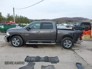 2015 Ram 1500 Big Horn z VIN 1C6RR7LT1FS520269, wystawiony jako IAAI lot #41706251 z przebiegiem 116 309 mil mil oraz . Historia ofert i sprzedaży dostępna na DreamBid. Obrazek 14.