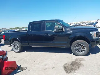 2018 Ford F-150 XL with VIN 1FTFW1EG9JFC63669, listed as a IAAI auction lot 41748012 with 143,584 mi miles. Bid and sale history available at carsss.com. Image 13.