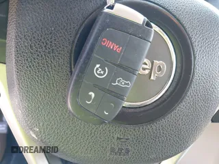 2014 Jeep Grand Cherokee Limited z VIN 1C4RJFBGXEC479342, wystawiony jako IAAI lot #42514199 z przebiegiem 207 493 mil mil oraz . Historia ofert i sprzedaży dostępna na DreamBid. Obrazek 11.