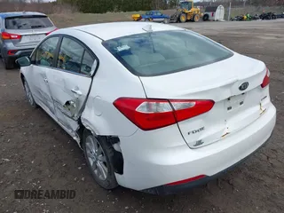 2014 Kia Forte EX with VIN KNAFX4A8XE5050378, listed as a IAAI auction lot 41923798 with 104,712 mi miles. Bid and sale history available at carsss.com. Image 3.