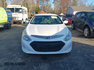 2013 Hyundai Sonata Hybrid with VIN KMHEC4A45DA065198, listed as a IAAI auction lot 42137511 with 219,500 mi miles. Bid and sale history available at carsss.com. Image 13.