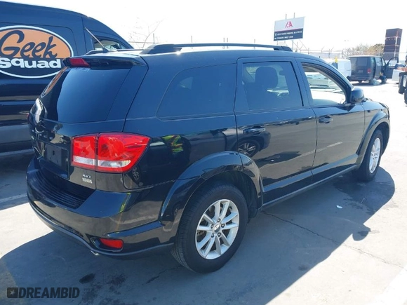 2013 Dodge Journey SXT with VIN 3C4PDCBG8DT636995, listed as a IAAI auction lot 42012559 with 105,120 mi miles. Bid and sale history available at carsss.com. Image 4.