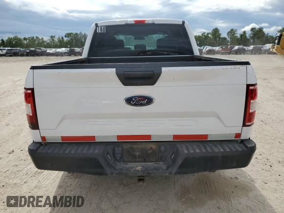 2019 Ford F-150 XL with VIN 1FTEW1CBXKKF14856, listed as a Copart auction lot 71306444 with 100,057 mi miles and Salvage title. Bid and sale history available at DreamBid. Image 6.