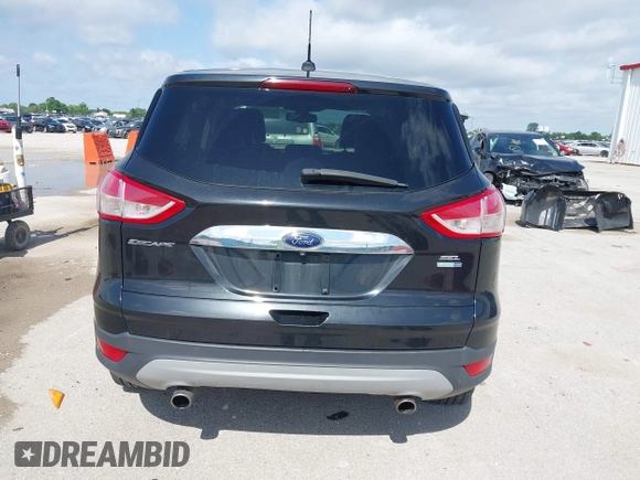 2013 Ford Escape SEL with VIN 1FMCU9HX1DUB97939, listed as a IAAI auction lot 42293561 with 196,951 mi miles and . Bid and sale history available at DreamBid. Image 17.
