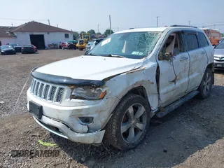 2015 Jeep Grand Cherokee Overland with VIN 1C4RJFCGXFC880096, listed as a IAAI auction lot 42706085 with 74,044 mi miles and . Bid and sale history available at DreamBid. Image 19.