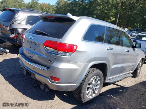 2014 Jeep Grand Cherokee Overland with VIN 1C4RJFCM4EC316142, listed as a IAAI auction lot 40607061 with 195,008 mi miles. Bid and sale history available at carsss.com. Image 4.