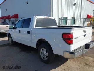 2013 Ford F-150 XL with VIN 1FTFW1CF2DKF73989, listed as a IAAI auction lot 41795990 with 142,387 mi miles. Bid and sale history available at carsss.com. Image 3.
