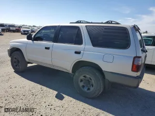 1997 Toyota 4Runner with VIN JT3GM84R7V0009560, listed as a Copart auction lot 77699954 with 214,861 mi miles and Clean Title. Bid and sale history available at carsss.com. Image 2.