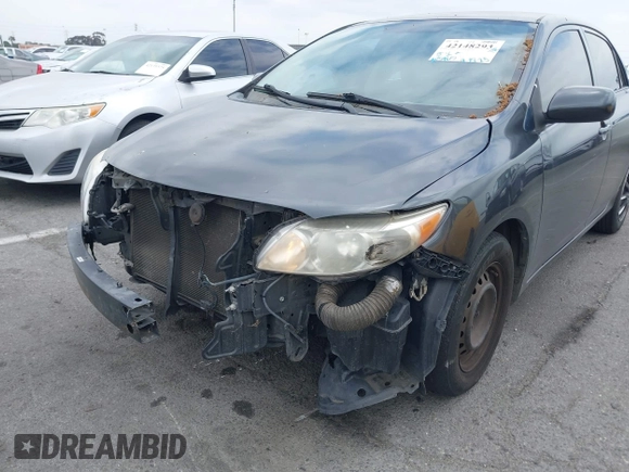 2010 Toyota Corolla with VIN 1NXBU4EE3AZ169217, listed as a IAAI auction lot 42148293 with 205,965 mi miles. Bid and sale history available at carsss.com. Image 6.