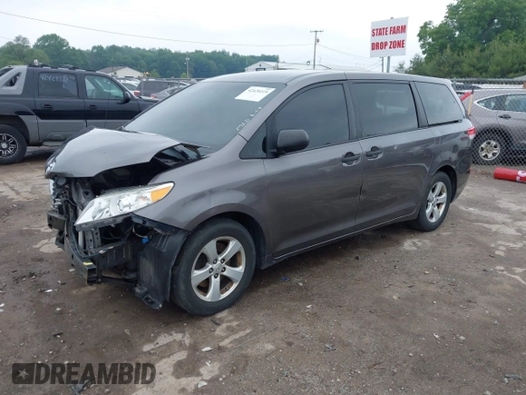 2014 Toyota Sienna L with VIN 5TDZK3DC5ES439593, listed as a IAAI auction lot 42420219 with 136,544 mi miles and . Bid and sale history available at DreamBid. Image 2.