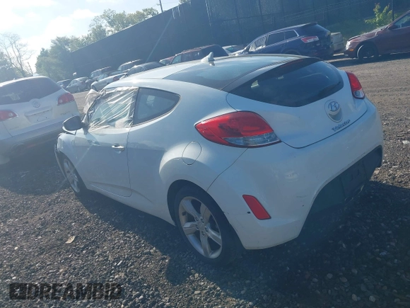 2013 Hyundai Veloster w/Gray Int with VIN KMHTC6AD2DU115735, listed as a IAAI auction lot 39404347 with 166,840 mi miles and . Bid and sale history available at DreamBid. Image 3.