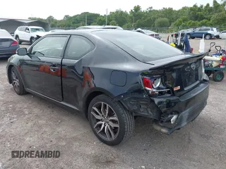 2014 Scion tC z VIN JTKJF5C76E3078256, wystawiony jako IAAI lot #42437930 z przebiegiem 239 399 mil mil oraz . Historia ofert i sprzedaży dostępna na DreamBid. Obrazek 3.