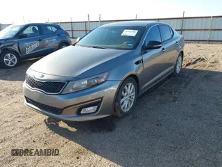 2015 Kia Optima EX z VIN 5XXGN4A7XFG402635, wystawiony jako IAAI lot #41952546 z przebiegiem 121 390 mil mil oraz . Historia ofert i sprzedaży dostępna na DreamBid. Obrazek 2.