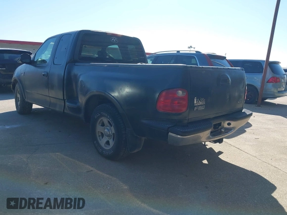 2001 Ford F-150 XL with VIN 2FTRX07W61CA71131, listed as a IAAI auction lot 41375828 with 216,340 mi miles. Bid and sale history available at carsss.com. Image 3.