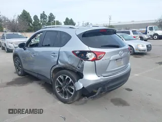 2016 Mazda CX-5 Grand Touring with VIN JM3KE2DY9G0723921, listed as a IAAI auction lot 41681522 with 83,893 mi miles. Bid and sale history available at carsss.com. Image 6.