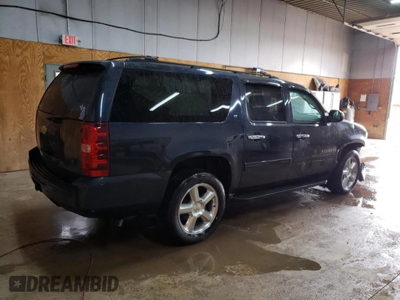2013 Chevrolet Suburban LT with VIN 1GNSKJE75DR191647, listed as a Copart auction lot 54132905 with 127,916 mi miles and Clean title. Bid and sale history available at DreamBid. Image 3.