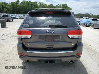 2014 Jeep Grand Cherokee Overland with VIN 1C4RJFCT7EC182234, listed as a Copart auction lot 54754465 with 185,658 mi miles and Salvage Title. Bid and sale history available at DreamBid. Image 6.