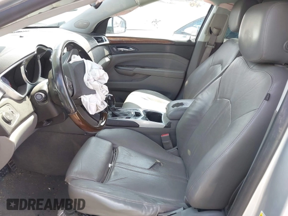 2012 Cadillac SRX Performance Collection with VIN 3GYFNBE37CS615517, listed as a IAAI auction lot 42541029 with 54,159 mi miles and . Bid and sale history available at DreamBid. Image 5.