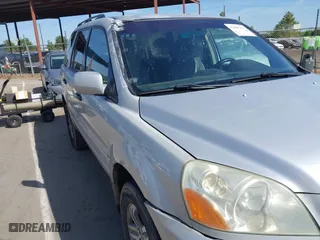 2003 Honda Pilot EX with VIN 2HKYF18443H571688, listed as a IAAI auction lot 42097297 with 313,910 mi miles. Bid and sale history available at carsss.com. Image 12.
