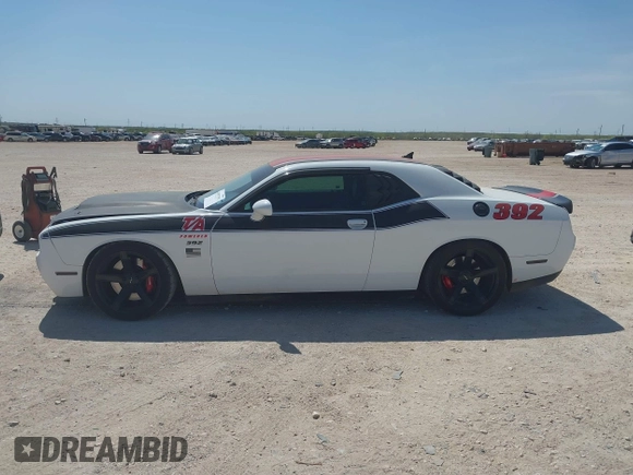 2019 Dodge Challenger R/T Scat Pack Widebody z VIN 2C3CDZFJ1KH546489, wystawiony jako IAAI lot #41857292 z przebiegiem 61 055 mil mil oraz . Historia ofert i sprzedaży dostępna na DreamBid. Obrazek 13.