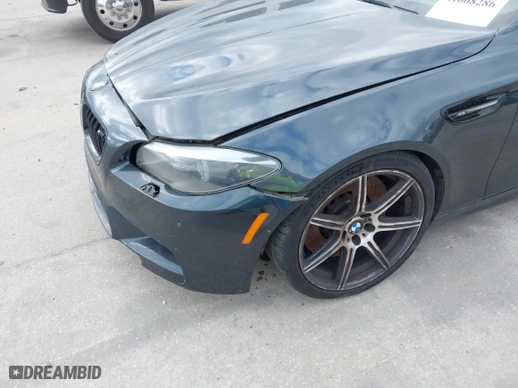 2013 BMW M5 with VIN WBSFV9C59DD096774, listed as a IAAI auction lot 41608286 with 82,601 mi miles. Bid and sale history available at carsss.com. Image 6.