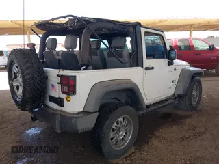2007 Jeep Wrangler X with VIN 1J4FA24137L128418, listed as a IAAI auction lot 42317921 with 148,412 mi miles and . Bid and sale history available at DreamBid. Image 4.