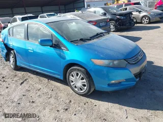 2010 Honda Insight LX with VIN JHMZE2H53AS005167, listed as a IAAI auction lot 41865442 with 23,981 mi miles. Bid and sale history available at carsss.com. Image 1.