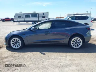 2023 Tesla Model 3 with VIN 5YJ3E1EAXPF617388, listed as a IAAI auction lot 42218748 with Not provided miles and . Bid and sale history available at DreamBid. Image 14.