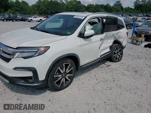 2019 Honda Pilot Touring 8-Passenger with VIN 5FNYF6H96KB067035, listed as a Copart auction lot 63933195 with 46,514 mi miles and Salvage title. Bid and sale history available at DreamBid. Image 14.