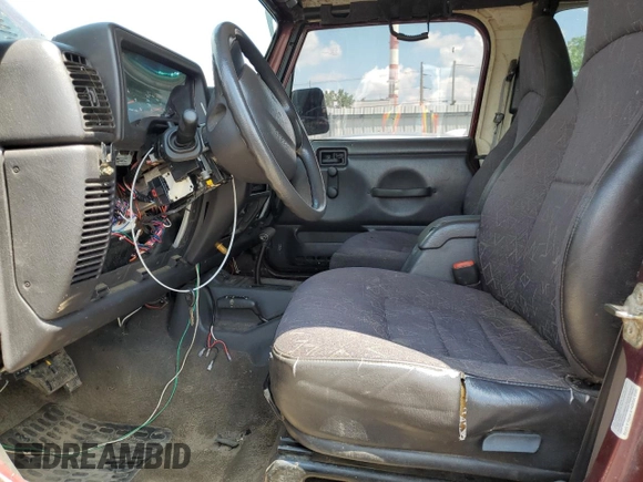 2002 Jeep Wrangler X with VIN 1J4FA39SX2P732881, listed as a Copart auction lot 64451185 with Not provided miles and Clean title. Bid and sale history available at DreamBid. Image 7.