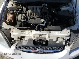 2000 Ford Taurus LX with VIN 1FAFP5222YA168638, listed as a Copart auction lot 60710415 with 119,948 mi miles and Salvage title. Bid and sale history available at DreamBid. Image 11.