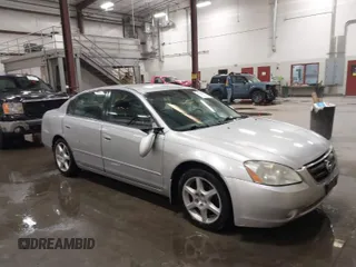 2003 Nissan Altima SE z VIN 1N4BL11D63C139615, wystawiony jako IAAI lot #41928363 z przebiegiem 113 251 mil mil oraz . Historia ofert i sprzedaży dostępna na DreamBid. Obrazek 1.