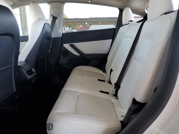 2021 Tesla Model Y Long Range z VIN 5YJYGDEE7MF228787, wystawiony jako Copart lot #47252275 z przebiegiem 59 823 mil mil oraz Szkoda całkowita • Salvage title. Historia ofert i sprzedaży dostępna na DreamBid. Obrazek 10.