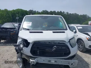 2016 Ford Transit Cargo with VIN 1FTYE1YM6GKB15539, listed as a IAAI auction lot 42228687 with 326,338 mi miles and . Bid and sale history available at DreamBid. Image 12.
