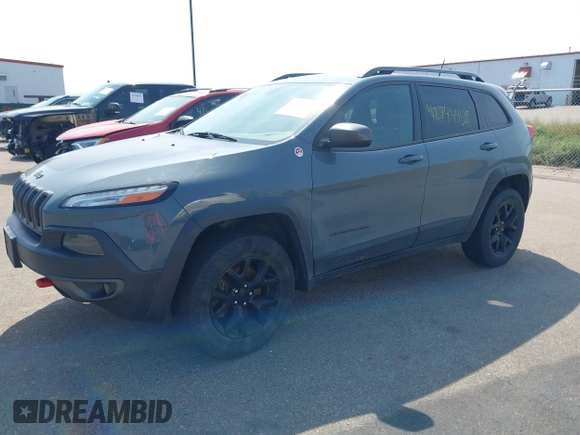 2015 Jeep Cherokee Trailhawk с VIN 1C4PJMBS7FW569497, выставлен на аукционе IAAI как лот 42744459 с пробегом 177 265 миль миль и . История ставок и продаж доступна на DreamBid. Изображение 2.