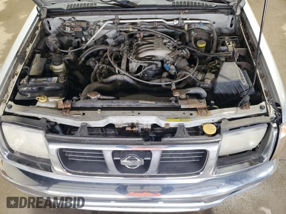 2000 Nissan Frontier XE z VIN 1N6ED26Y2YC369789, wystawiony jako Copart lot #53255695 z przebiegiem 165 792 mil mil oraz Czysty tytuł • Clean title. Historia ofert i sprzedaży dostępna na DreamBid. Obrazek 11.