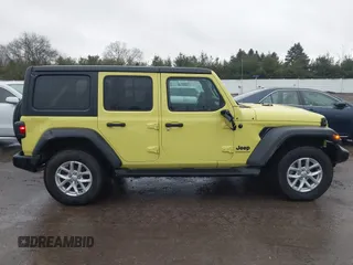 2023 Jeep Wrangler Sport with VIN 1C4HJXDG9PW631109, listed as a IAAI auction lot 41149861 with 27,570 mi miles and . Bid and sale history available at DreamBid. Image 13.