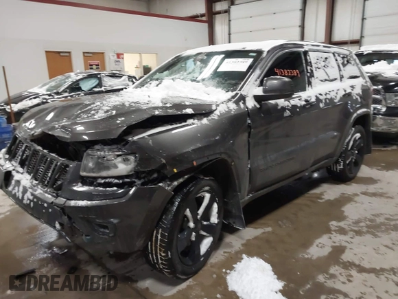 2015 Jeep Grand Cherokee Laredo with VIN 1C4RJFAGXFC752489, listed as a IAAI auction lot 41382389 with 147,892 mi miles. Bid and sale history available at carsss.com. Image 2.