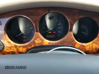 1999 Jaguar XJ with VIN SAJHX604XXC854217, listed as a Copart auction lot 56042735 with 127,092 mi miles and Salvage title. Bid and sale history available at DreamBid. Image 9.