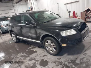 2004 Volkswagen Touareg with VIN WVGCM77L64D073815, listed as a IAAI auction lot 41615223 with 140,090 mi miles and . Bid and sale history available at DreamBid. Image 1.
