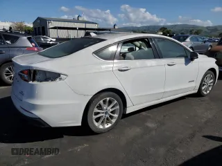 2019 Ford Fusion Hybrid SE with VIN 3FA6P0LU2KR188517, listed as a Copart auction lot 51855195 with Not Provided miles and Salvage Title. Bid and sale history available at carsss.com. Image 3.