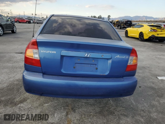2001 Hyundai Accent GL with VIN KMHCG45C91U195735, listed as a Copart auction lot 80950554 with 164,176 mi miles and Salvage Title. Bid and sale history available at carsss.com. Image 6.