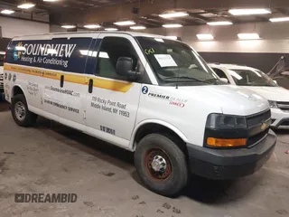2020 Chevrolet Express Cargo Van with VIN 1GCWGBFB4L1205443, listed as a IAAI auction lot 41612714 with 87,883 mi miles. Bid and sale history available at carsss.com. Image 1.