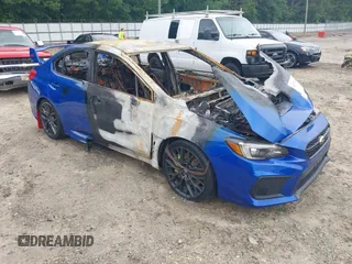 2019 Subaru WRX STI z VIN JF1VA2R61K9829489, wystawiony jako IAAI lot #42376314 z przebiegiem Nie podano mil oraz . Historia ofert i sprzedaży dostępna na DreamBid. Obrazek 1.