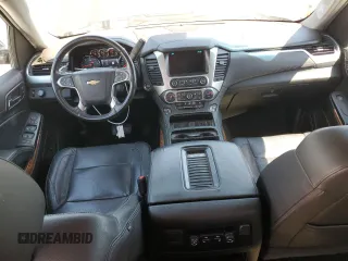 2018 Chevrolet Suburban Premier with VIN 1GNSCJKC4JR189639, listed as a Copart auction lot 64221035 with 110,256 mi miles and Salvage title. Bid and sale history available at DreamBid. Image 8.