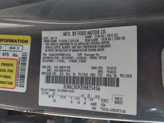 2014 Lincoln MKZ z VIN 3LN6L2G92ER835456, wystawiony jako IAAI lot #41985573 z przebiegiem 174 080 mil mil oraz . Historia ofert i sprzedaży dostępna na DreamBid. Obrazek 9.