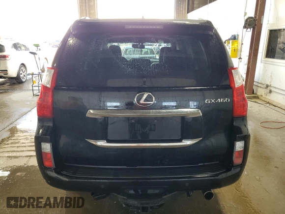 2012 Lexus GX 460 Premium with VIN JTJJM7FX4C5046554, listed as a Copart auction lot 46518085 with 219,060 mi miles and Salvage title. Bid and sale history available at DreamBid. Image 6.